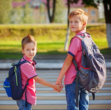 School kids crossing street