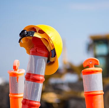 Workzone pylons and hard hat