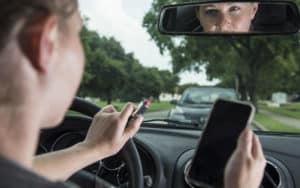 Distracted female driver